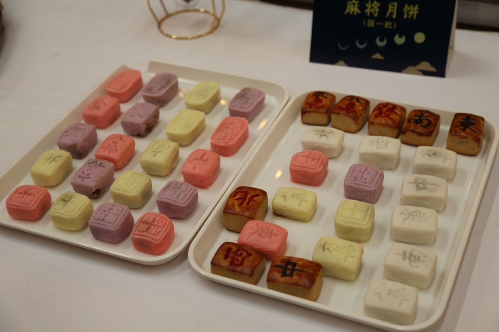 <font color='#000000'>重庆一景区推出象棋麻将月饼！吃出“文创”味</font>